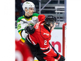 Abakar Kazbekov of the London Knights jostles for position during an Ontario Hockey League game against the Owen Sound Attack at Budweiser Gardens on Friday Dec. 16, 2022. Kazbekov, 18, would die hours later. (Mike Hensen/The London Free Press)