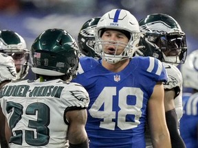 Indianapolis Colts tight end Nikola Kalinic (48) exchanges words with Philadelphia Eagles safety C.J. Gardner-Johnson on the field after a play Sunday, Nov. 20, 2022, at Lucas Oil Stadium in Indianapolis.