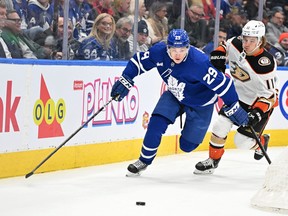 Toronto Maple Leafs forward Pontus Holmberg moves the. puck against the Anaheim Ducks on Dec. 13.