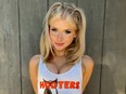 Ali Dulin, a.k.a. Ali Spice on social media, in Hooters tank top. She was killed in a car accident. She was 21.