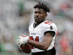 Tampa Bay Buccaneers wide receiver Antonio Brown walks on the field during an NFL football game against the New York Jets, Sunday, Jan. 2, 2022, in East Rutherford, N.J.