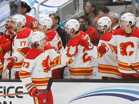 Calgary Flames forward Tyler Toffoli celebrates with teammates scoring a goal against the San Jose Sharks at SAP Center in San Jose, Calif., on Tuesday, Dec. 20, 2022.