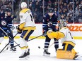 Winnipeg Jets right wing Blake Wheeler (26) reacts to a shot on Nashville Predators goaltender Juuse Saros (74) in the second period at Canada Life Centre in Winnipeg on Thursday, Dec. 15, 2022.