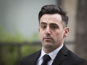 Canadian musician Jacob Hoggard arrives at the Toronto courthouse for sentencing after being found guilty earlier this year of sexually assaulting an Ottawa woman, on Thursday, October 20, 2022.