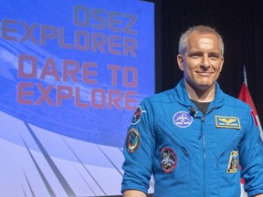 Canadian astronaut David Saint-Jacques leaves the stage after speaking to media July 10, 2019, at the Canadian Space Agency headquarters in St. Hubert, Que.