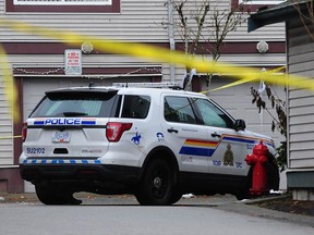Surrey RCMP at the scene on 66th Avenue in Newton a day after a woman was fatally stabbed on Dec. 7, 2022.