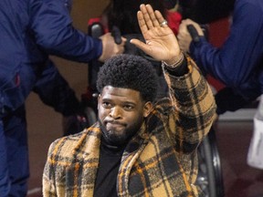 Former Montreal Canadien P.K. Subban waves to fans during a tribute to his career prior to National Hockey League game against the Nashville Predators in Montreal Thursday Jan. 12, 2023.