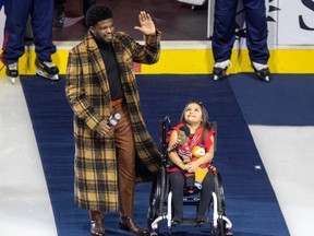 Former Montreal Canadiens defenceman P.K. Subban brought his friend, Mila, onto the ice for a tribute to his career prior to a game against the Nashville Predators in Montreal on Jan. 12, 2023.