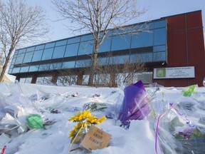 Floral and other tributes were seen in the areas around the Centre culturel islamique de Québec in Quebec City in February 2017.