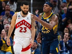 Indiana Pacers guard Buddy Hield (righ) celebrates his game-clinching three-point basket against the Toronto Raptors.
