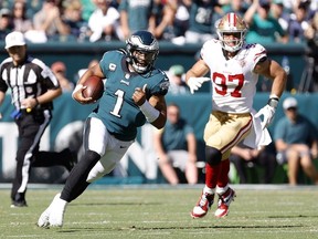 quarterback Jalen Hurts of the Philadelphia Eagles runs the ball in the fourth quarter in the game against the San Francisco 49ers at Lincoln Financial Field on September 19, 2021 in Philadelphia, Pennsylvania.
