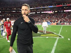 Head coach Kliff Kingsbury of the Arizona Cardinals walks off the field following the NFL game against the Tampa Bay Buccaneers at State Farm Stadium on December 25, 2022 in Glendale, Arizona.