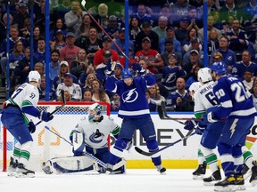 Corey Perry of the Tampa Bay Lightning celebrates a goal in the first period during a game against the Vancouver Canucks at Amalie Arena on January 12, 2023 in Tampa, Florida.