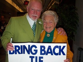 Don Cherry and then Mississauga Mayor Hazel McCallion hold a Welcome Back Tie sign.