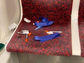 This 2021 file photo, shows discarded needles, tourniquets and other trash on a TTC streetcar