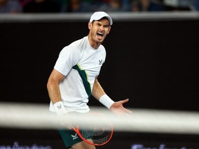 Britain's Andy Murray reacts during his second round match against Australia's Thanasi Kokkinakis at Melbourne Park in Melbourne, Australia, Jan. 19, 2023.