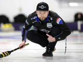 Mike McEwen watches his shot during the provincial men's curling championship at the Selkirk Curling Club in Selkirk on Sunday, Feb. 13, 2022. (KEVIN KING/Postmedia Network)
