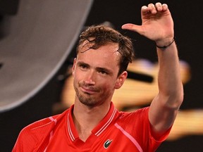 Russia's Daniil Medvedev celebrates after winning against Marcos Giron of the US at the end of their men's singles match on day one of the Australian Open tennis tournament in Melbourne on January 16, 2023.