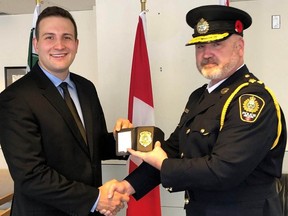 Constable Mathieu Nolet, left, with Chief Donovan Fisher of the Nelson Police Department. Nolet suffered severe internal injuries and died Saturday morning in Kelowna’s hospital, Chief Donovan Fisher said in a video statement.