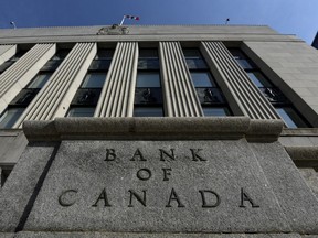 The Bank of Canada may lose up to $8.8 billion over the next few years, according to a new report warning the losses may pose a communications challenge for the central bank. The Bank of Canada building is seen in Ottawa, on May 31, 2022.