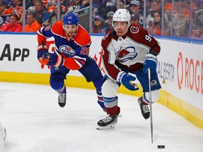 Colorado Avalanche forward Evan Rodrigues (9) controls the puck against Edmonton Oilers forward Leon Draisaitl (29) during the second period at Rogers Place.