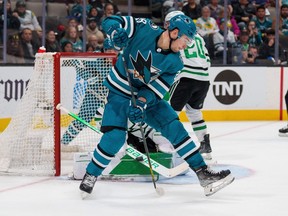 Dallas Stars goaltender Jake Oettinger (29) makes a save against San Jose Sharks right wing Timo Meier (28) during the second period at SAP Center at San Jose, Calif., on Wednesday, Jan. 18, 2023.