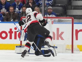 Senators defenceman Thomas Chabot scores a goal against the Maple Leafs during the first period of Friday's game at Toronto.