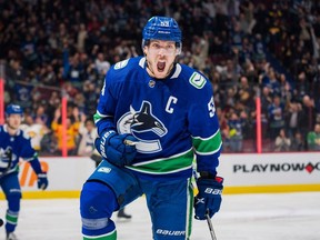 Vancouver Canucks forward Bo Horvat (53) celebrates his goal against the Vegas Golden Knights in the first period at Rogers Arena in April 2022.
