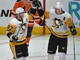 File photo/ Pittsburgh Penguins Sidney Crosby celebrates scoring his goal with Evgeni Malkin on Edmonton Oilers goalie Cam Talbot during NHL action at Rogers Place in Edmonton, October 23, 2018.