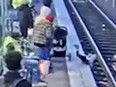 A screenshot from video of a toddler falling onto train tracks after being pushed at the Gateway Transit Centre MAX platform in Northern Portland.