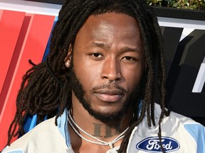 NFL player Alvin Kamara of the New Orleans Saints walks the red carpet prior to the NASCAR Clash at the Coliseum at Los Angeles Memorial Coliseum in Los Angeles, Feb. 5, 2023.