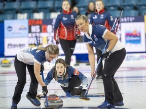 Christina Black and her Nova Scotia teammates stole points in extra ends twice Friday to win their way into the final four at the Scotties Tournament of Hearts.