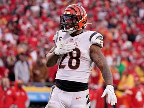 Cincinnati Bengals running back Joe Mixon (28) reacts after a play against the Kansas City Chiefs during overtime of the AFC Championship Game at GEHA Field at Arrowhead Stadium Jan. 30, 2022.