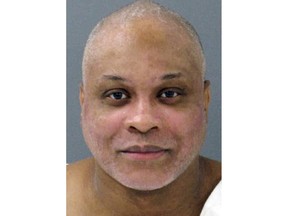 This booking photo provided by the Texas Department of Criminal Justice shows Texas death row inmate John Balentine, who was convicted of killing three teenagers while they slept in a home more than 25 years ago.