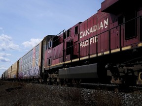 Canadian Pacific Railway trains sit at the main CP Rail trainyard in Toronto on Monday, March 21, 2022.