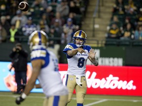 The Winnipeg Blue Bombers' quarterback Zach Collaros (8) makes a pass to Nic Demski (10) during first half CFL action against the The Edmonton Elks at Commonwealth Stadium, in Edmonton Saturday Sept. 18, 2021. Photo by David Bloom