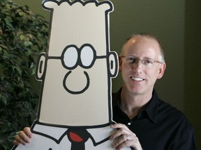 Scott Adams, creator of the comic strip Dilbert, poses for a portrait with the Dilbert character in his studio in Dublin, Calif., Oct. 26, 2006.