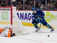 Philadelphia Flyers defenceman Nick Seeler dives to block a shot taken by Vancouver Canucks forward Andrei Kuzmenko in the third period at Rogers Arena. Canucks won 6-2.