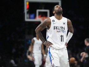 Brooklyn Nets' Kyrie Irving reacts during the second half of the team's game against the Detroit Pistons Thursday, Jan. 26, 2023 in New York.