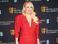 Rebel Wilson poses for photographers at the BAFTA Awards in London, March 13, 2022.