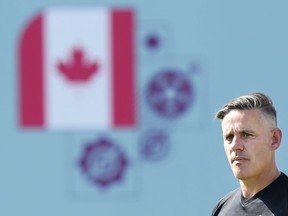Canada head coach John Herdman watches his team during practice at the World Cup in Doha, Qatar on Monday, November 28, 2022.
