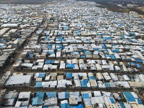 A general view of Karama camp for internally displaced Syrians, Monday, Feb. 14, 2022 by the village of Atma, Idlib province, Syria. The federal government is appealing a judge's declaration that four Canadian men being held in Syrian camps are entitled to Ottawa's help to return home.