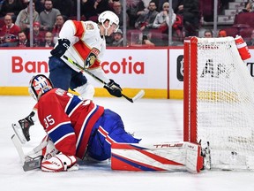 Anton Lundell #15 of the Florida Panthers scores on goaltender Sam Montembeault #35 of the Montreal Canadiens during the third period at Centre Bell on March 30, 2023 in Montreal.