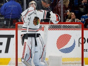 Chicago Blackhawks goaltender Alex Stalock (32) watches the video board after giving up two goals within 14 seconds in the third period against the Colorado Avalanche.