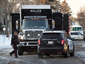 Edmonton Police respond to an shooti gincident in the city's northwest. Officers confirm they are mourning the loss of two patrol officers.