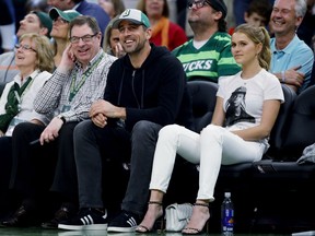 Aaron Rodgers of the Green Bay Packers and Mallory Edens during Game Five of the Eastern Conference Finals of the 2019 NBA Playoffs between the Toronto Raptors and Milwaukee Bucks at the Fiserv Forum on May 23, 2019 in Milwaukee, Wisconsin.
