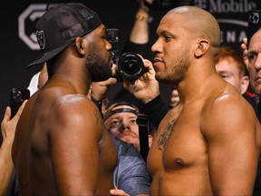 U.S. mixed martial arts fighter Jon Jones (left) and French mixed martial arts fighter Ciryl Gane face off during the ceremonial weigh-in ahead of their UFC 285 heavyweight title bout at the MGM Garden Arena, in Las Vegas, Nevada on March 3, 2023.