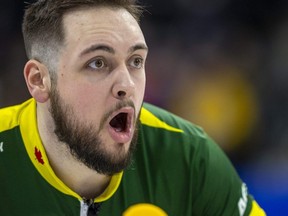 Team Northern Ontario skip Tanner Horgan shouts instructions to his sweepers during their morning draw against Alberta Sunday morning at the Brier at Budweiser Gardens in London, Ont. Photograph taken on Sunday March 5, 2023. (Mike Hensen/The London Free Press)
