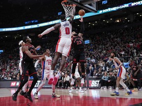 Toronto Raptors guard Fred VanVleet (23) drives to the basket as Detroit Pistons center Jalen Duren (0) tries to defend during the third quarter at Scotiabank Arena.