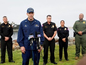 Captain James Spitler, from the U.S. Coast Guard, speaks to members of the media after two fishing boats capsized off the coast of San Diego, Sunday, March 12, 2023.